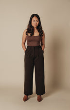 Petite dress pants in Espresso, a deep warm brown, front view in the studio, wide straight leg cut for petite proportions
