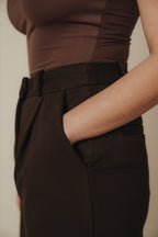 Petite dress pants in Espresso, a deep warm brown, close-up of the waistband, front pleat and side pocket