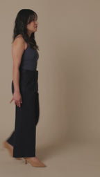 Petite dress pants in Midnight, a deep navy blue, studio turn showing the front, side with heels and back pockets